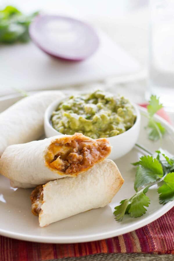 plate with Baked Mexican Egg Rolls and Enchilada Guacamole