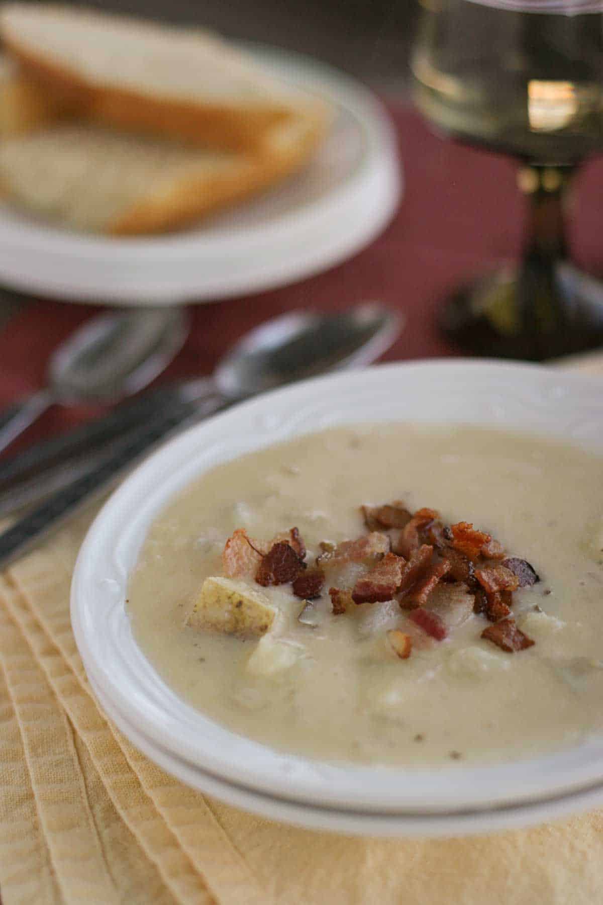 bowl of Baked Potato Soup topped with bacon