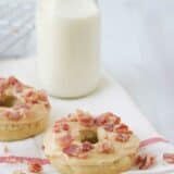 Banana Baked Donuts with Peanut Butter and Bacon with milk behind