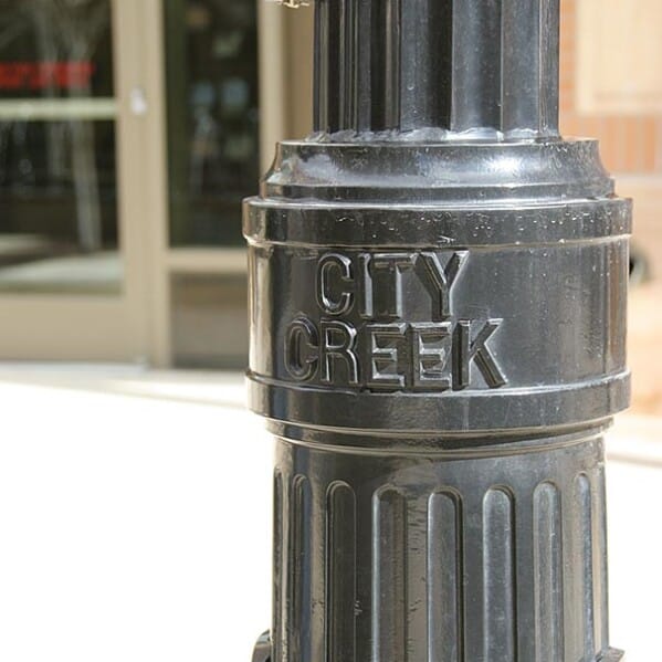 Light pole with City Creek on it.