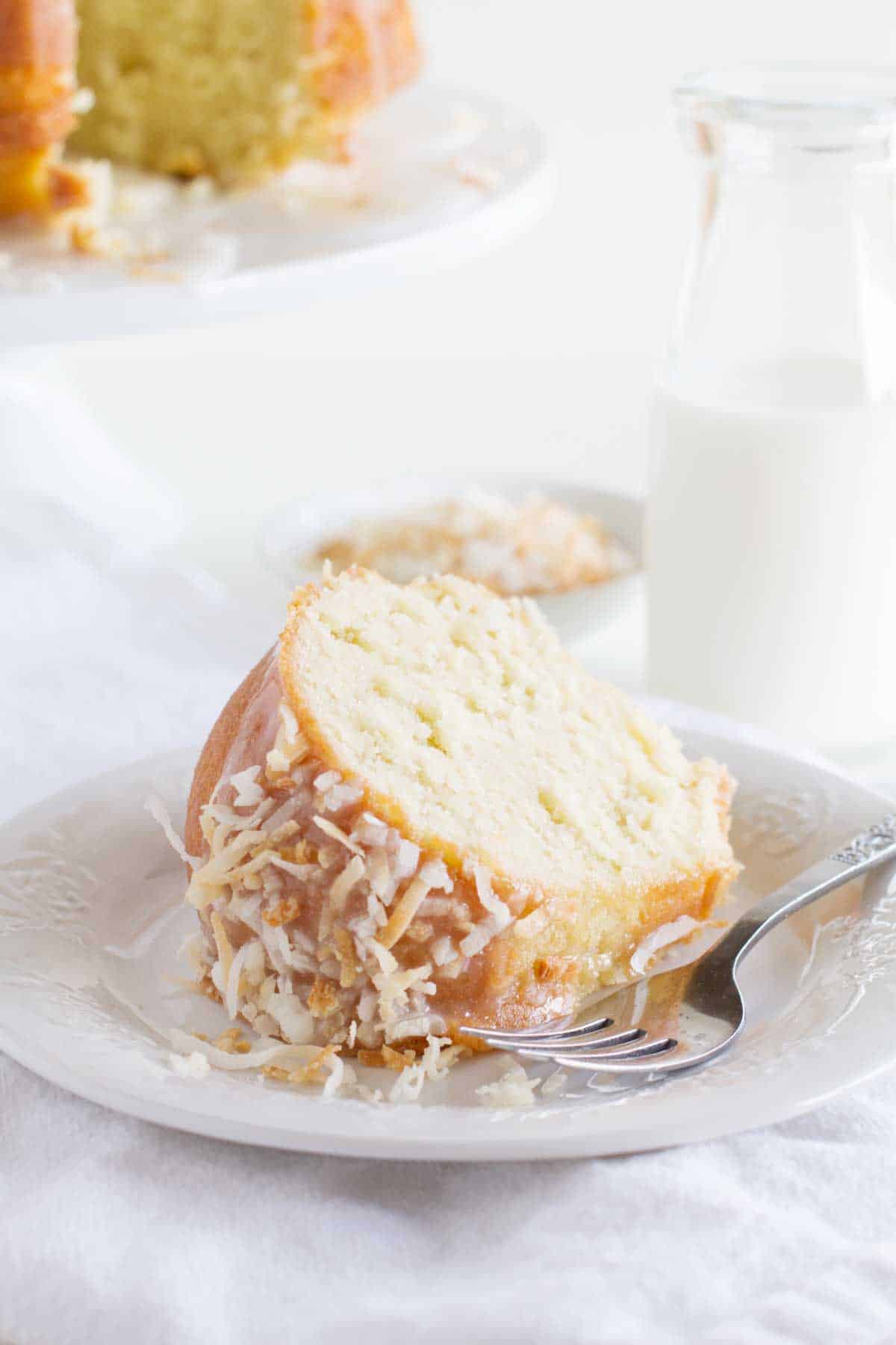 slice of coconut bundt cake on a plate