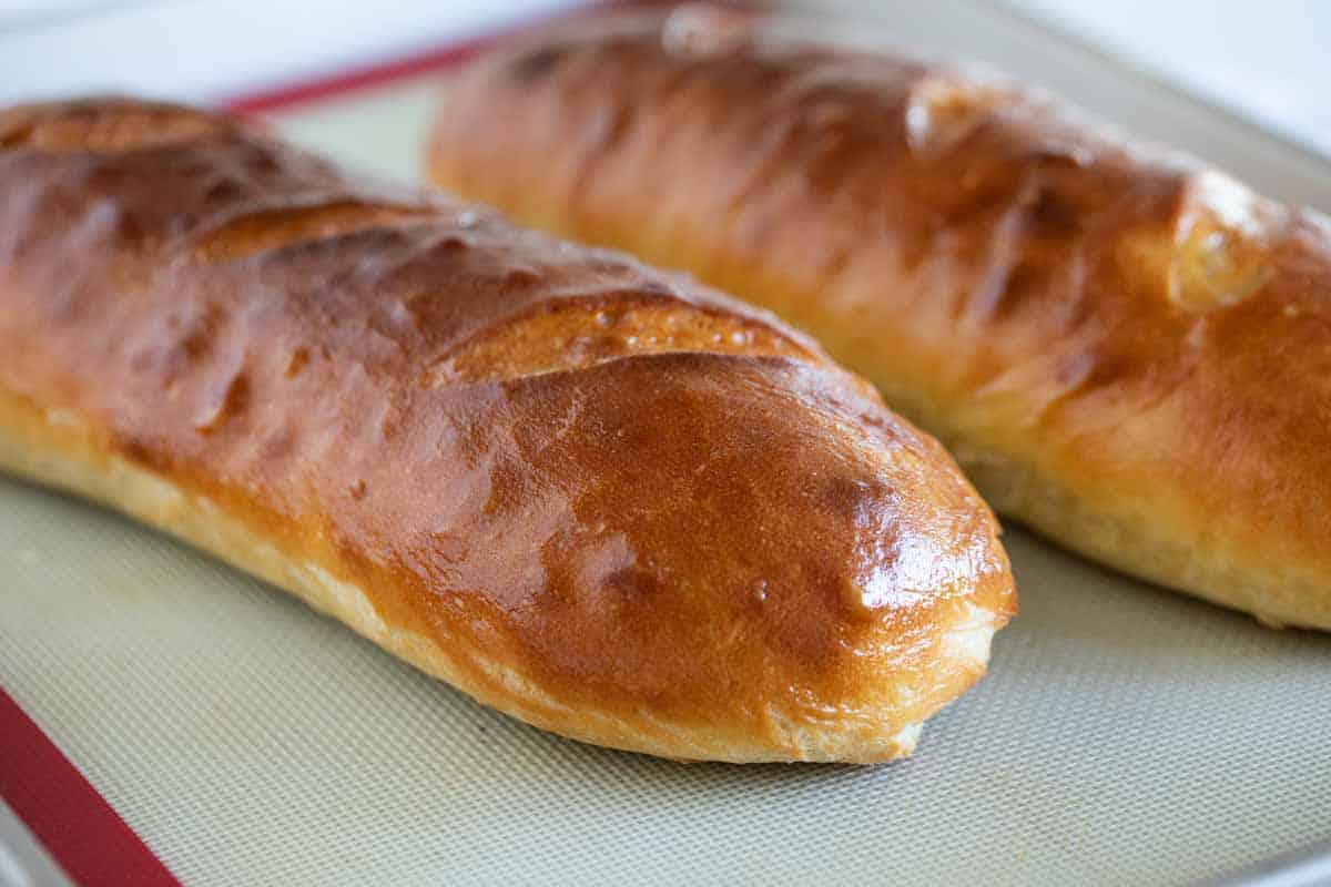 Two loaves of French bread on a baking sheet