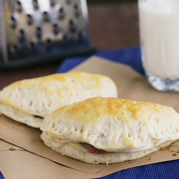 2 Ham and Cheese Pockets on brown paper