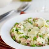 Ham Risotto with Peas in a shallow bowl