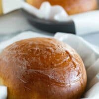 boules of hawaiian bread in parchment paper