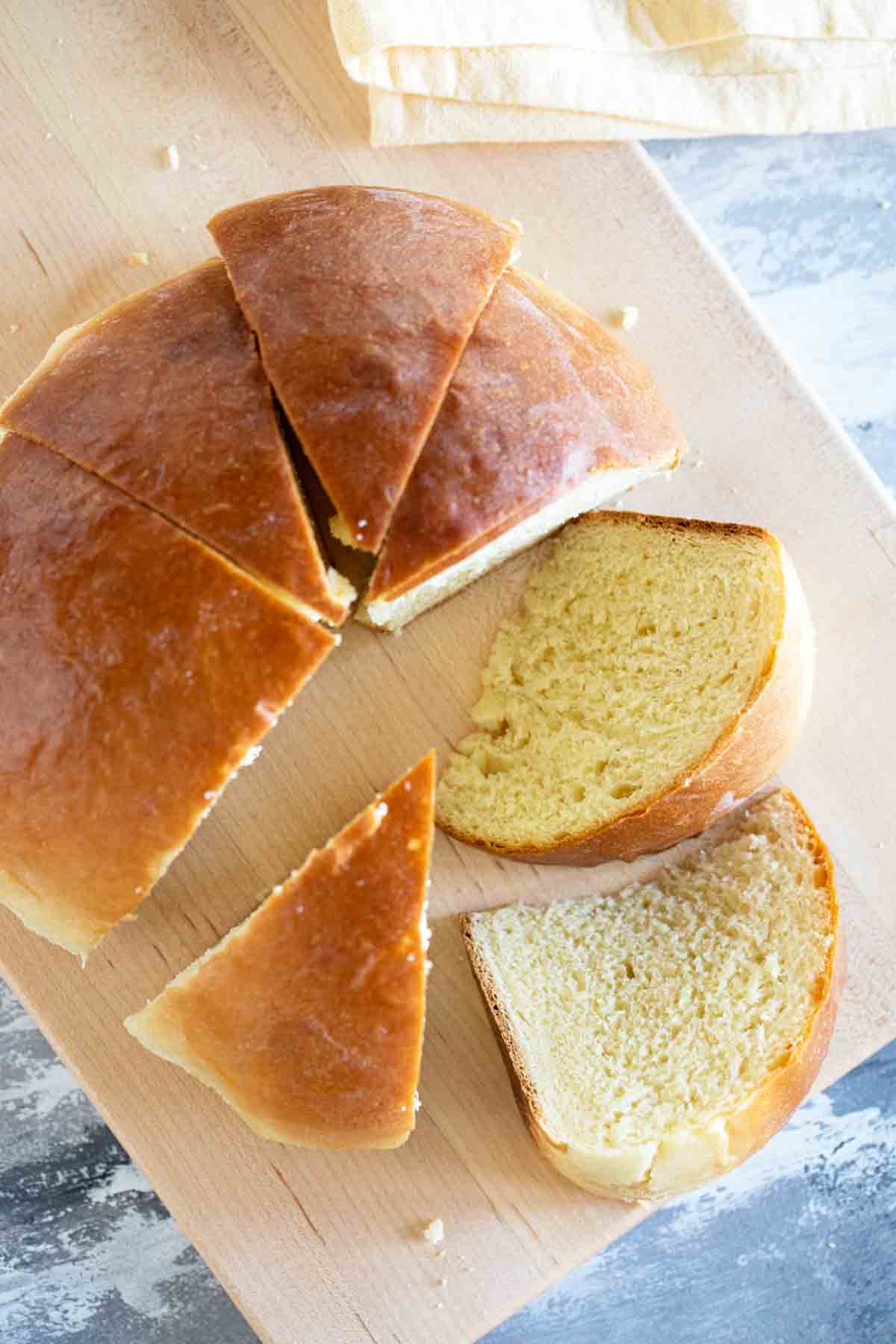 overhead view of loaf of Hawaiian bread cut into wedges