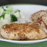 Honey Rosemary Chicken on a plate with rice pilaf and vegetables