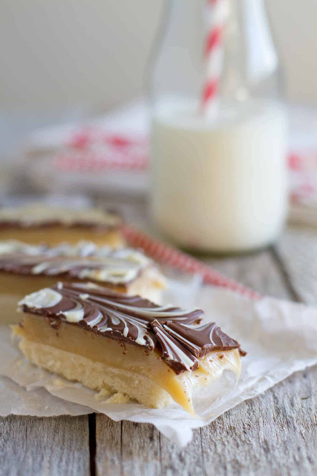 Marbled Caramel Chocolate Slice with a bite taken from it.