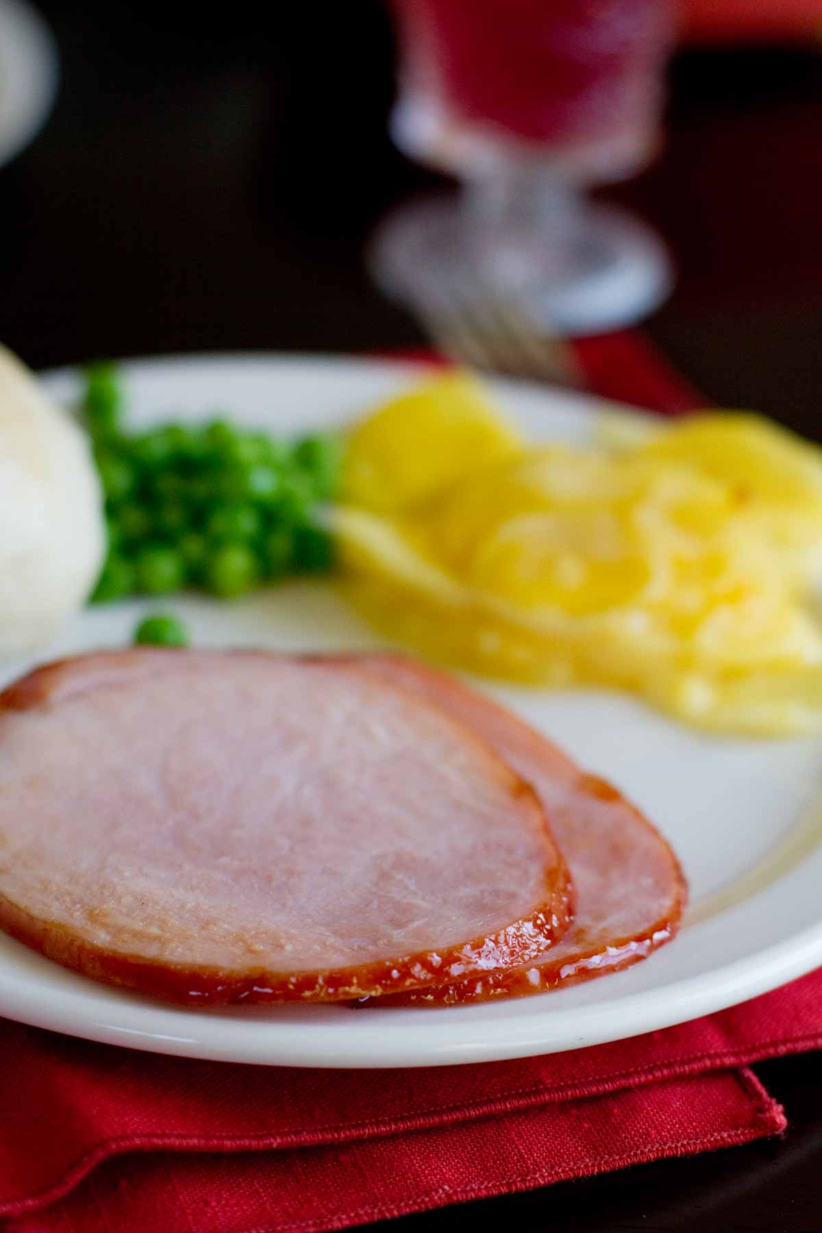 slices of Root Beer Glazed Ham on a plate