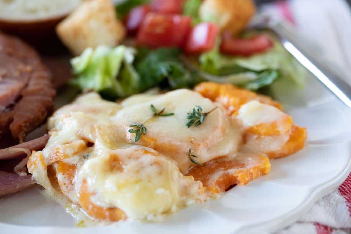 scalloped sweet potatoes on a plate