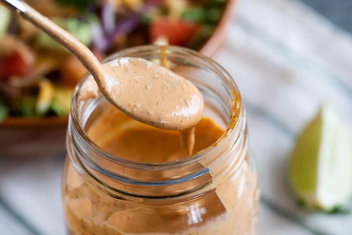 jar of Chipotle Ranch Dressing with a spoon