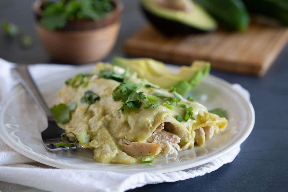 plate with serving of Green Chicken Enchiladas