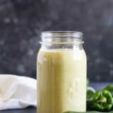 jar full of homemade green enchilada sauce