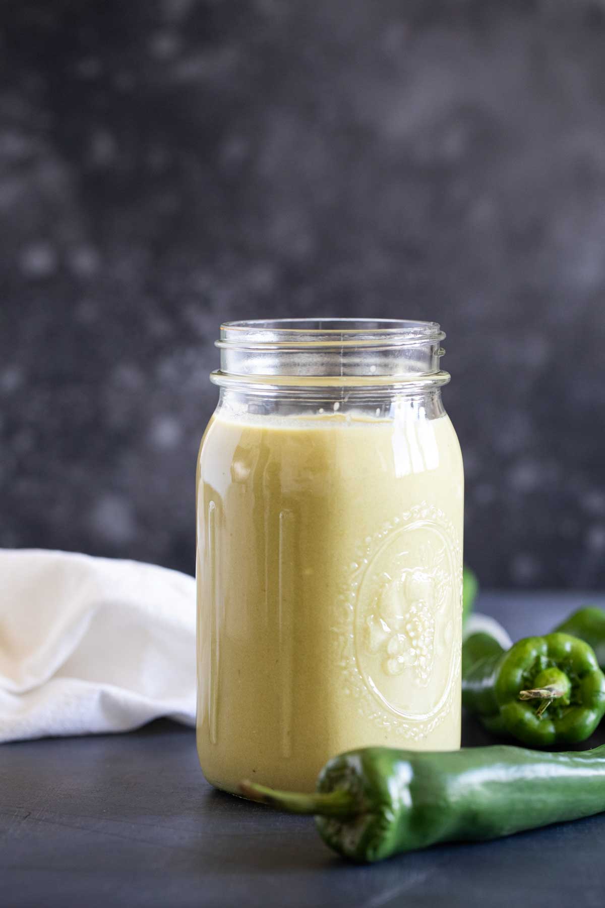 jar full of homemade green enchilada sauce