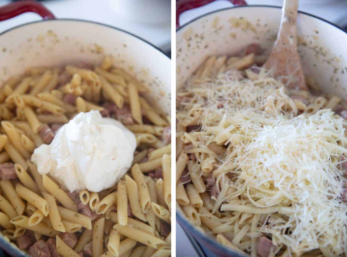 adding sour cream and cheese to pasta in a Dutch oven