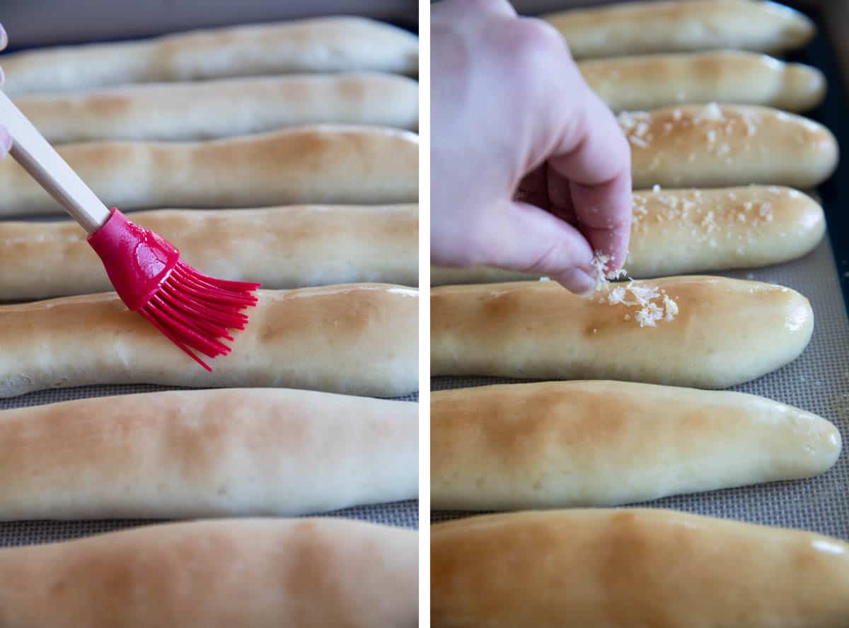 brushing butter on breadsticks and adding cheese and garlic