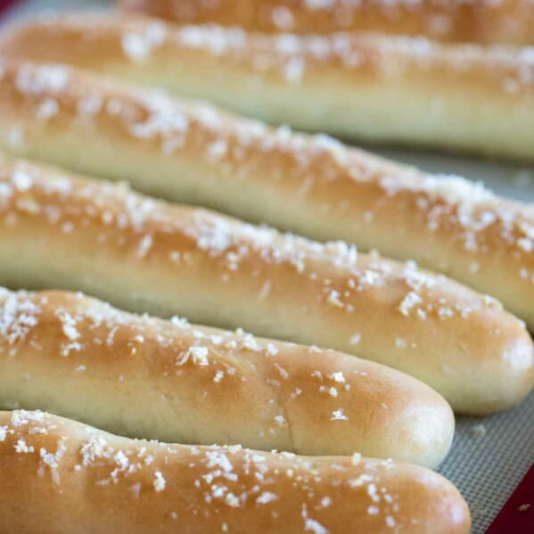 breadsticks topped with parmesan and garlic