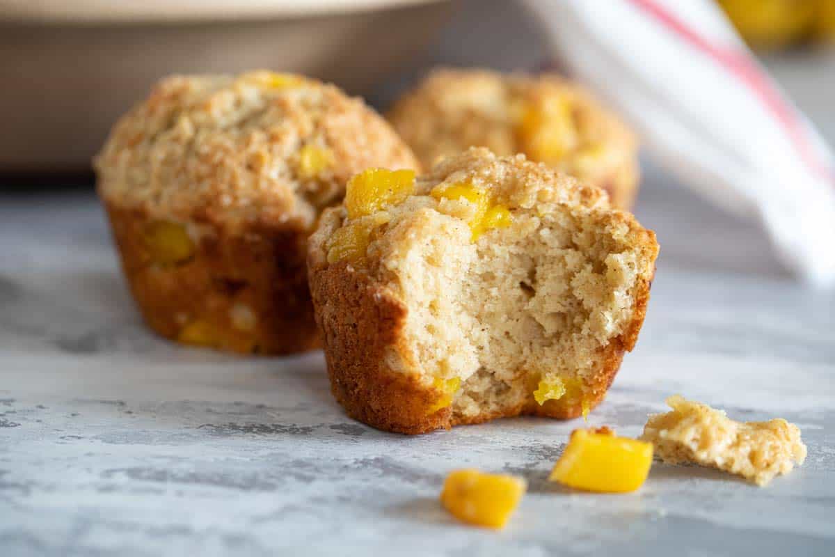 Mango Muffins with Banana with a bite taken from it