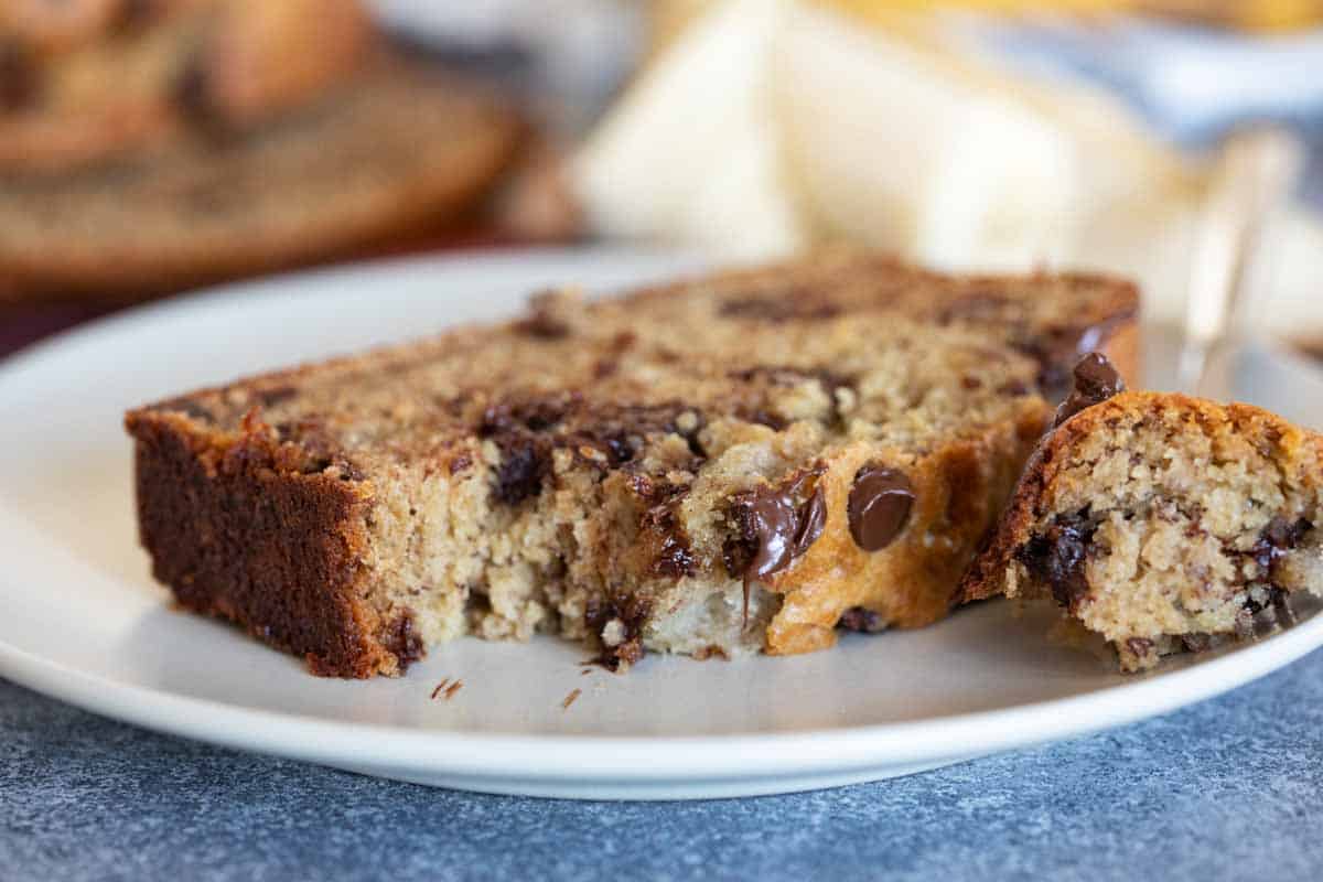 slice of peanut butter banana bread with a bite taken from it
