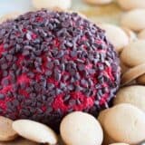 Red Velvet Cheese Ball on a plate with cookies