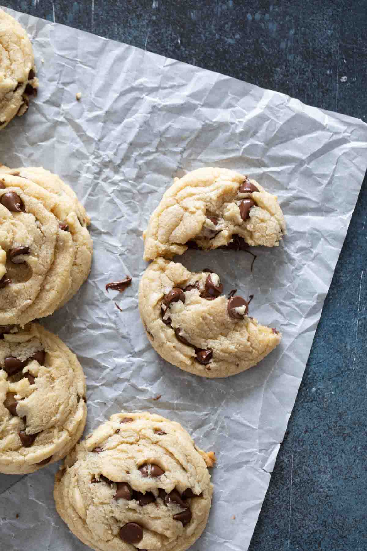 chocolate chip cookies with one broken in half