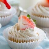 Tres Leches Cupcakes topped with a strawberry