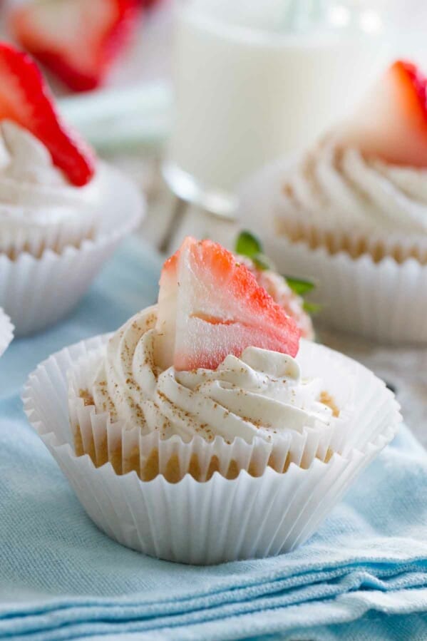 Tres Leches Cupcakes topped with a strawberry