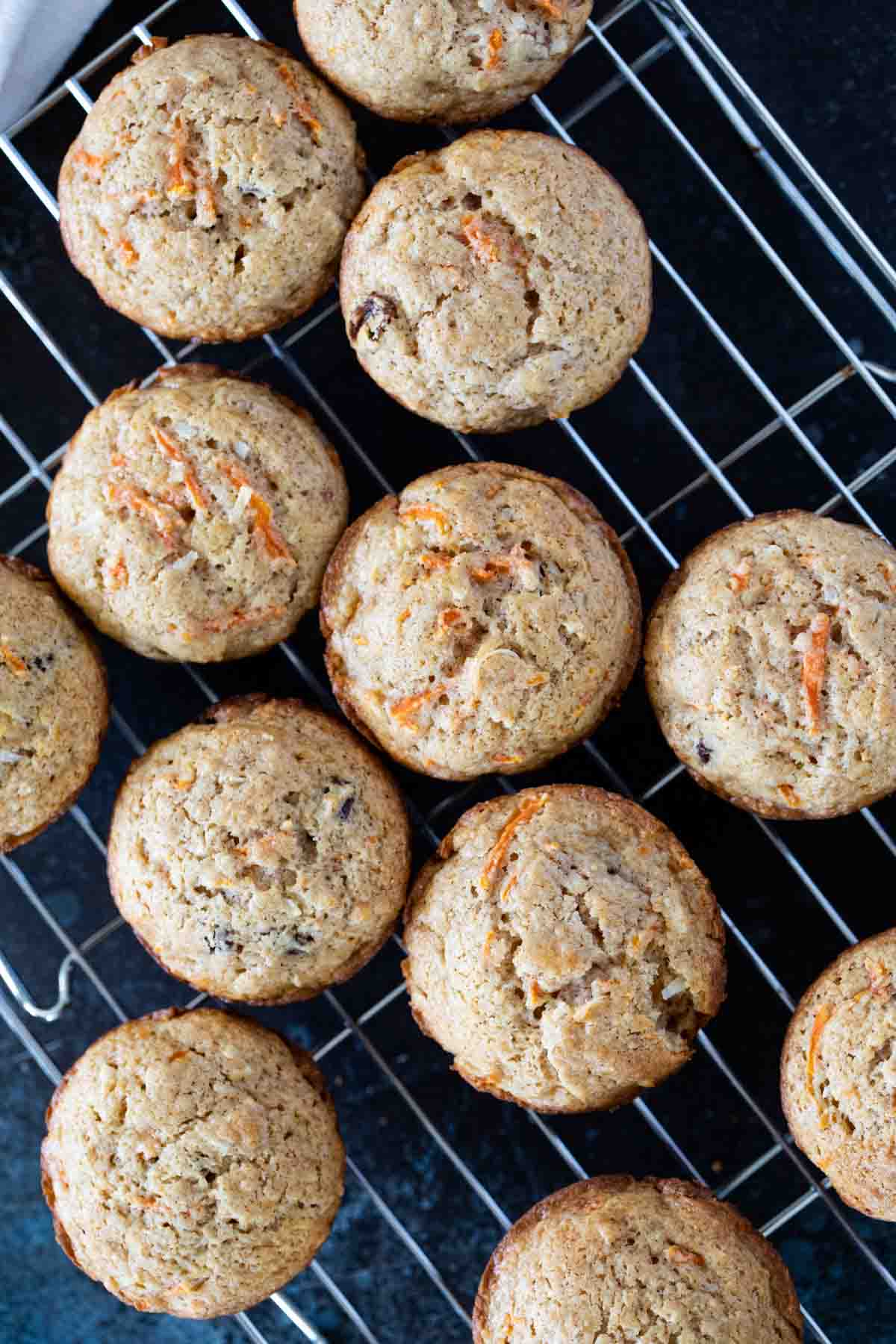 Carrot muffins on a cooling rack.