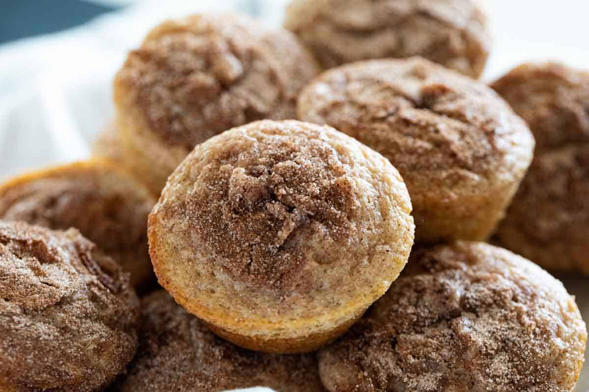 Cinnamon Muffins stacked in a basket