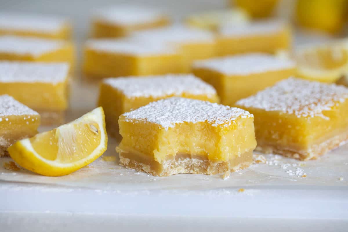 Lemon Bars with a bite taken from one