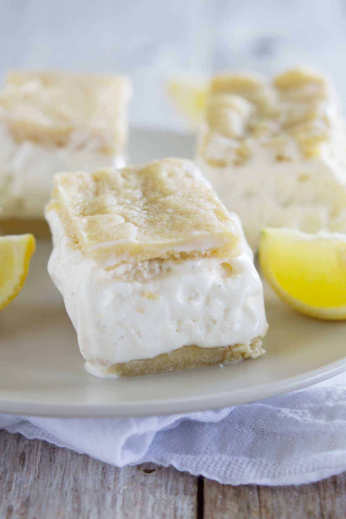 lemon cookies with lemon ice cream sandwiched between