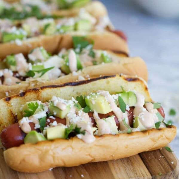 Mexican Hot Dogs on a cutting board