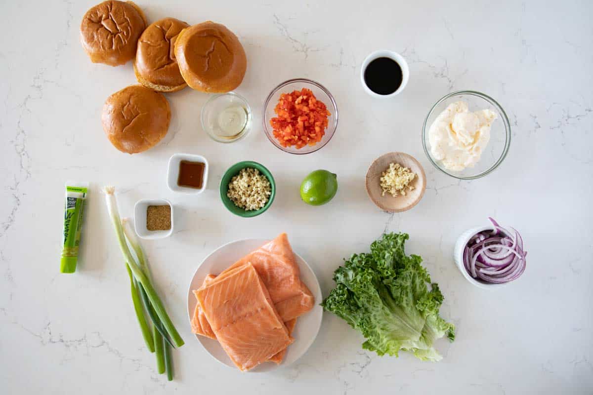 Change up burger night with these Salmon Burgers with Ginger Wasabi Mayonnaise. A delicious dinner with a ton of flavor - perfect for fish lovers! ingredients needed to make salmon burgers