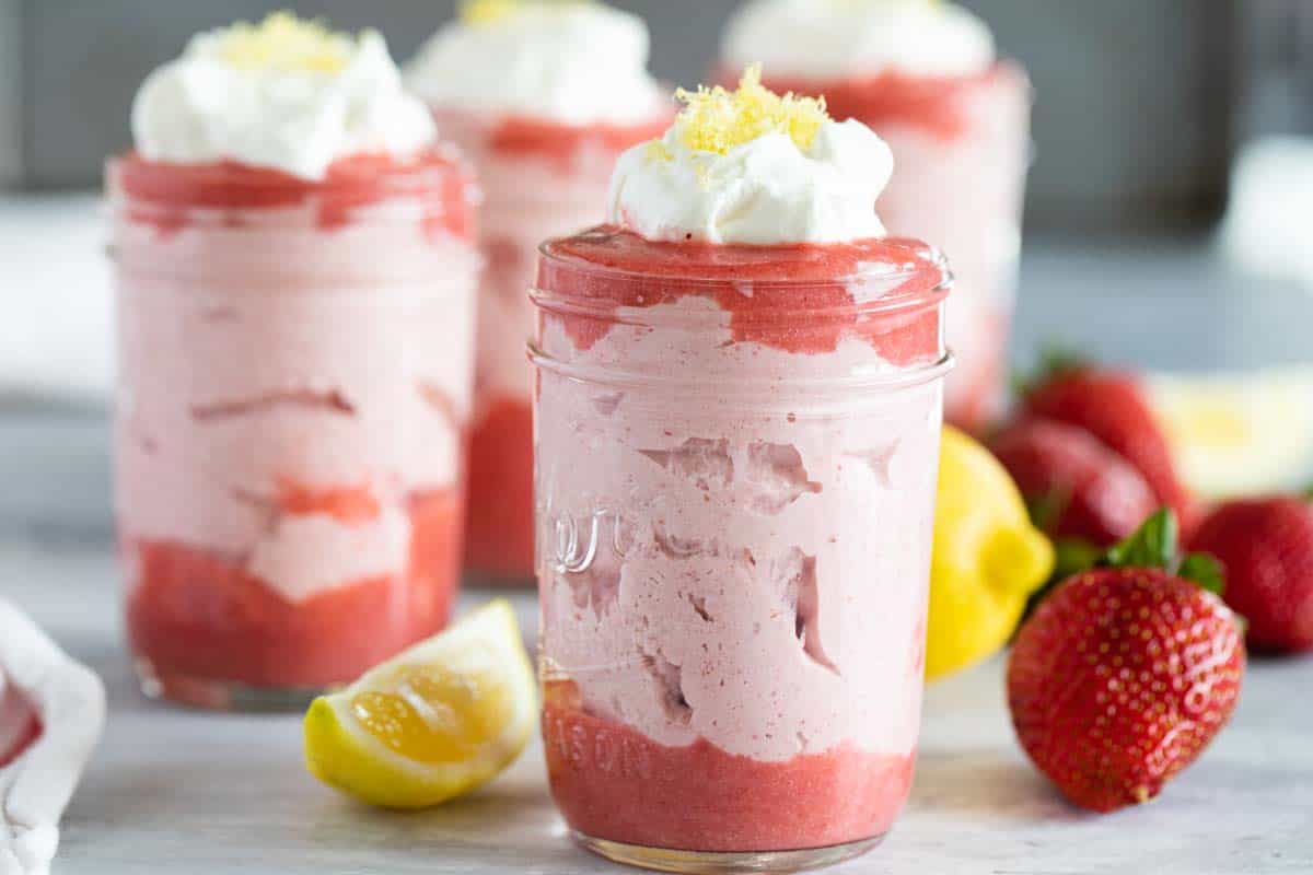 Strawberry Mousse with strawberry sauce topped with whipped cream