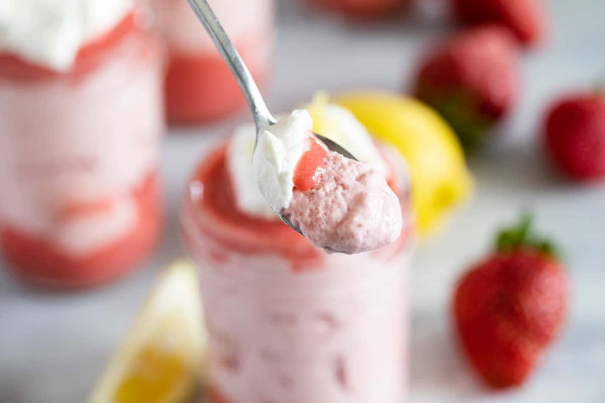 strawberry mousse on a spoon showing texture