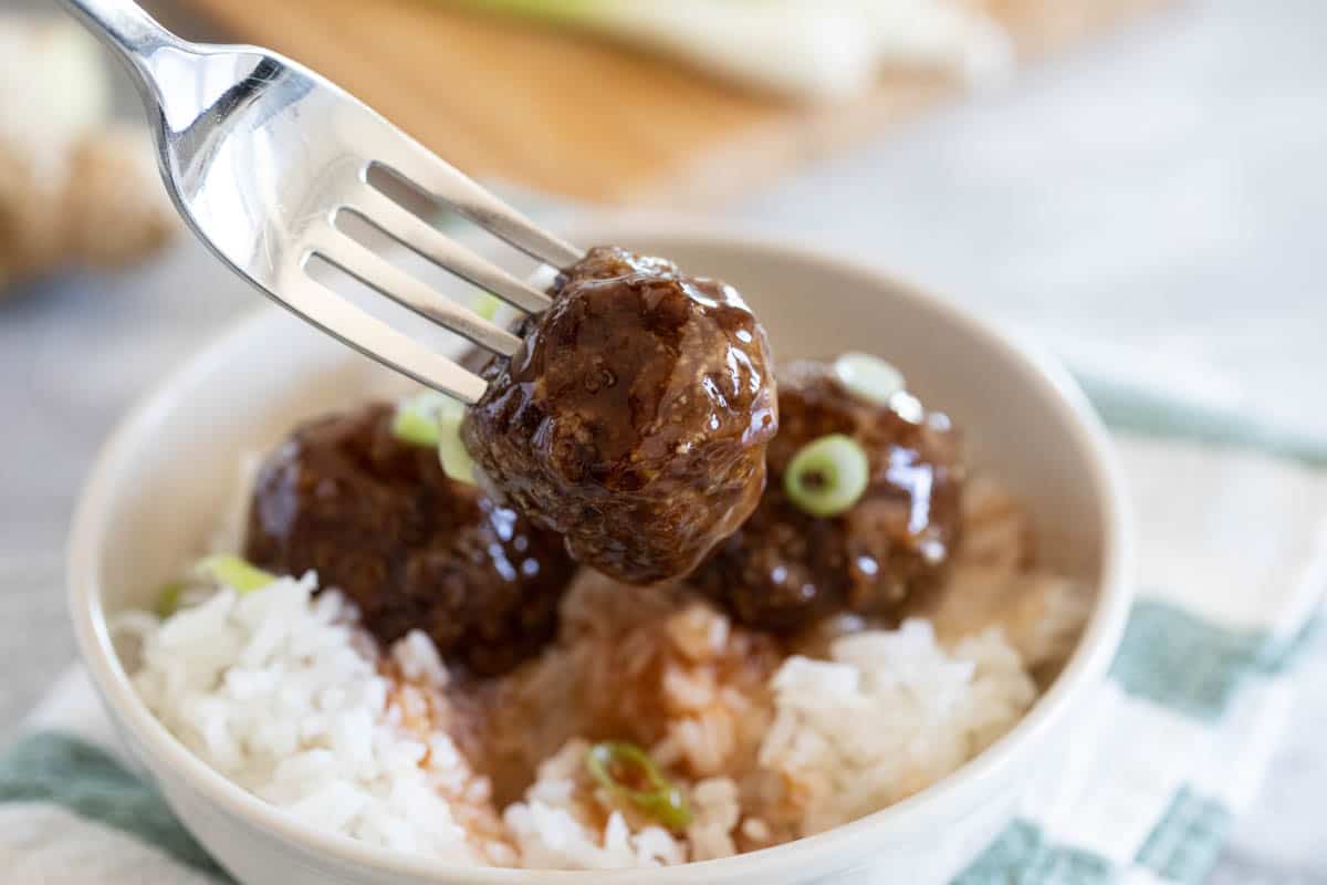 sweet and sour meatball on a fork