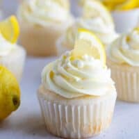 Lemon Buttercream Frosting on top of cupcake with a lemon slice