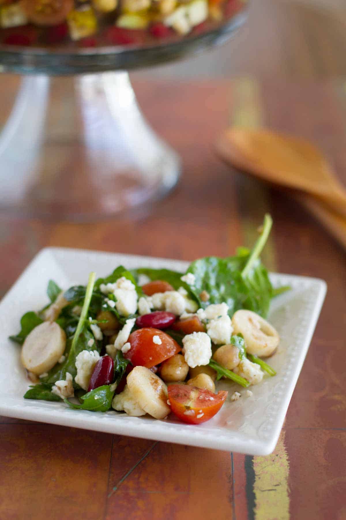 Serving of Two Bean Salad with Hearts of Palm and Blue Cheese on a plate.