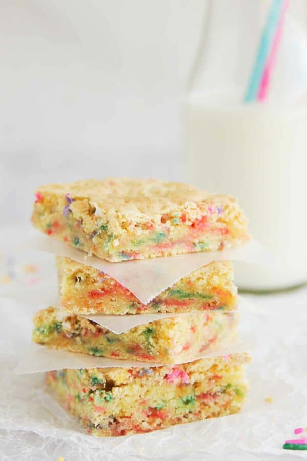 4 Cake Batter Blondies stacked on top of each other