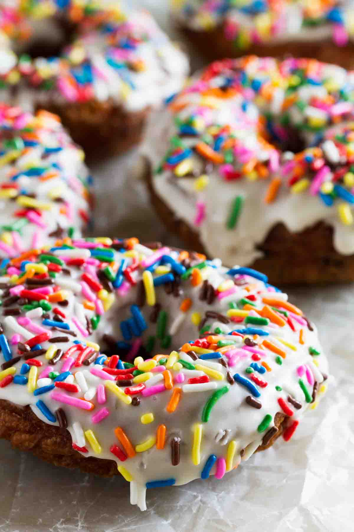 Homemade Funfetti Donuts topped with more sprinkles