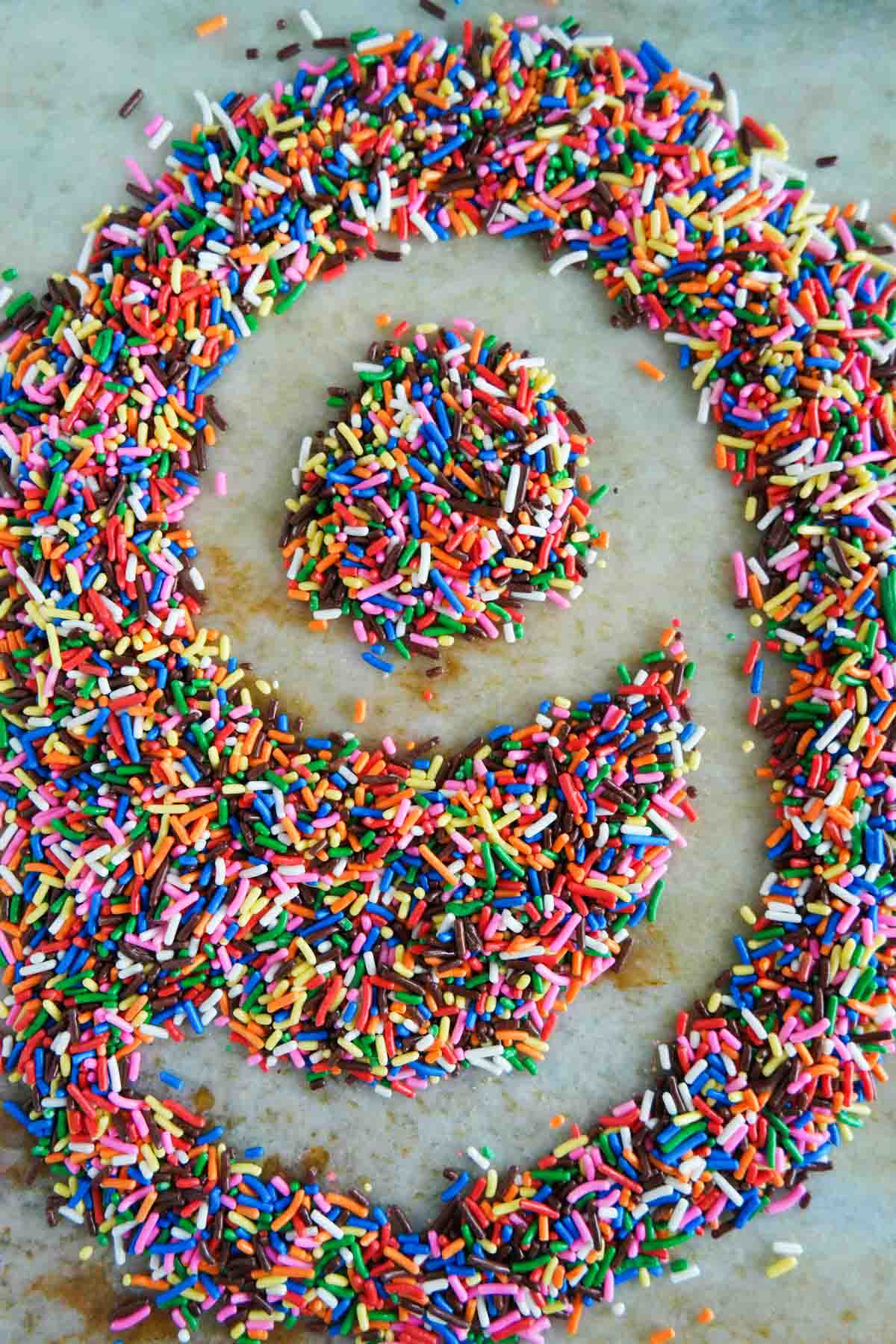 sprinkles on a counter forming the number 9