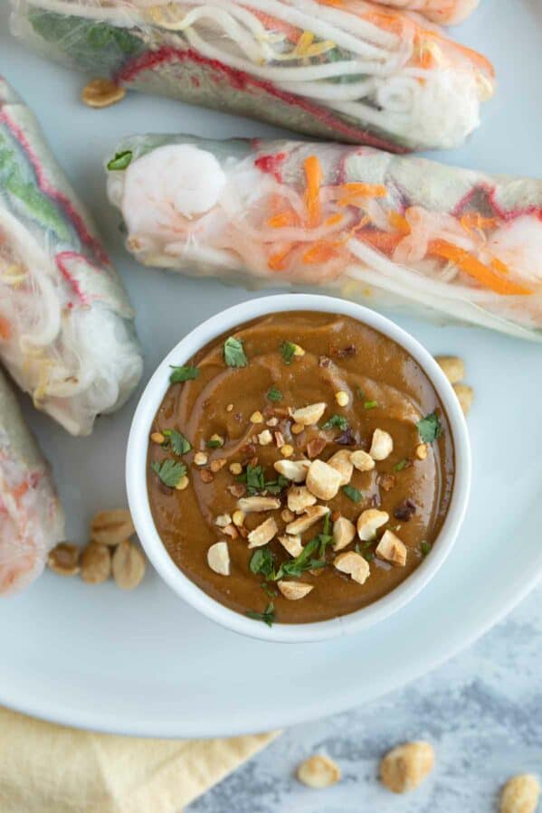 Peanut sauce topped with chopped peanuts and cilantro