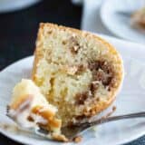slice of sour cream coffee cake with a fork