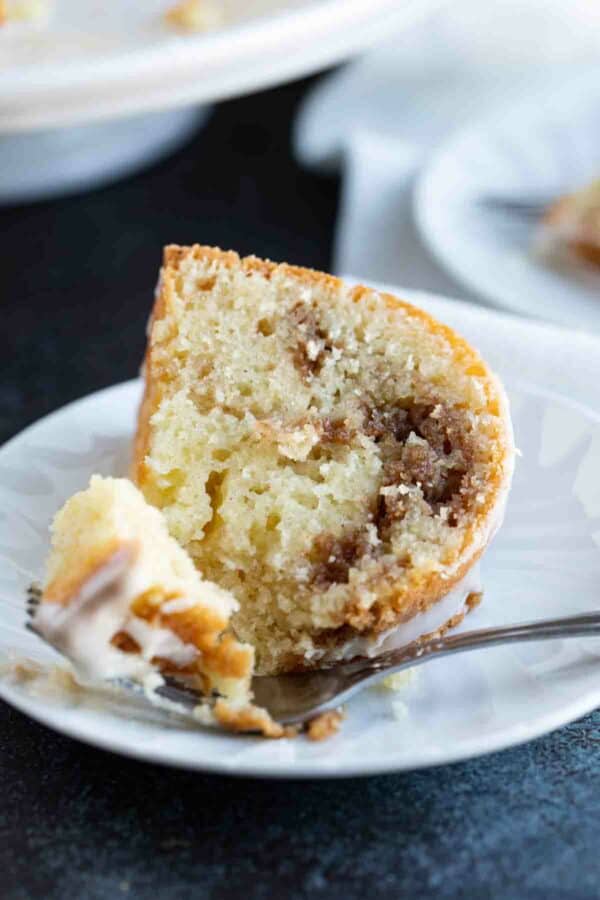 slice of sour cream coffee cake with a fork