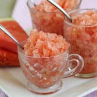 Watermelon Granita in small cups with spoons