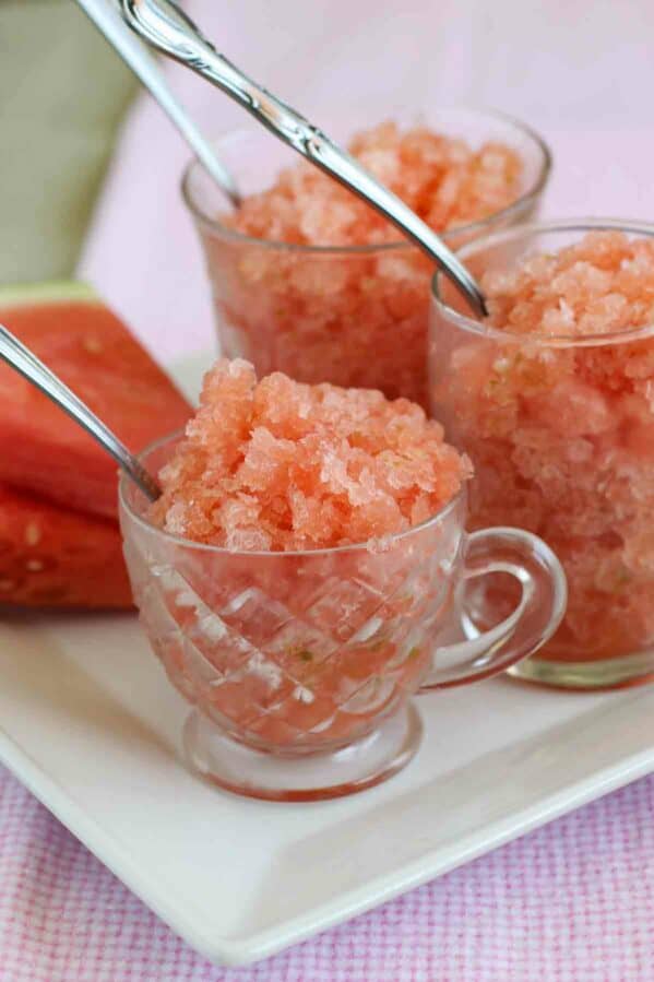 Watermelon Granita in small cups with spoons