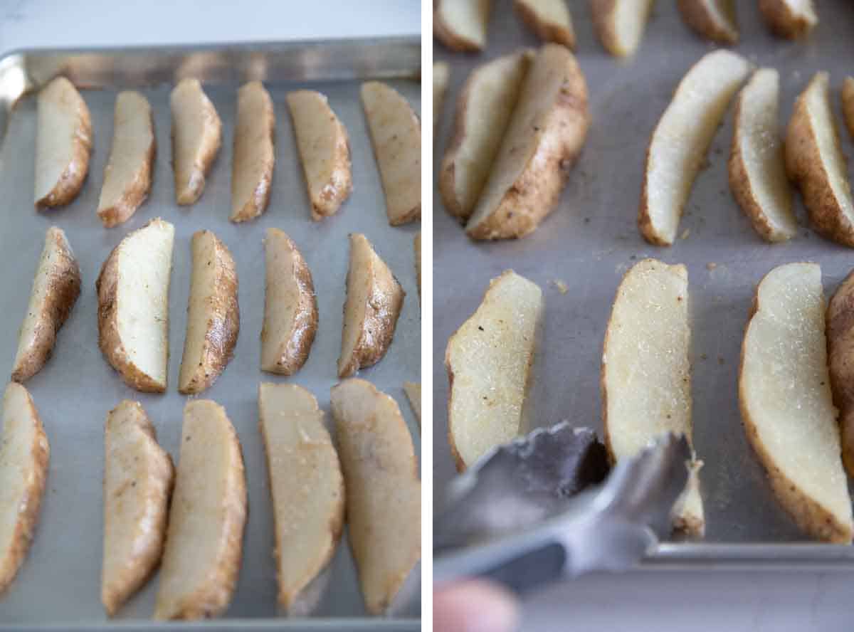 Potato wedges on a baking sheet being flipped as they bake.