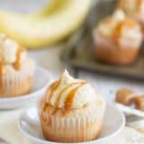 Caramel Banana Cupcakes drizzled with caramel on a plate