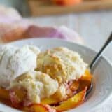 bowl with coconut and peach cobbler