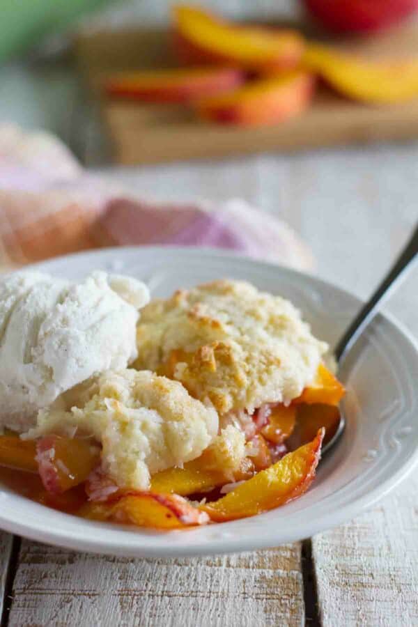 bowl with coconut and peach cobbler